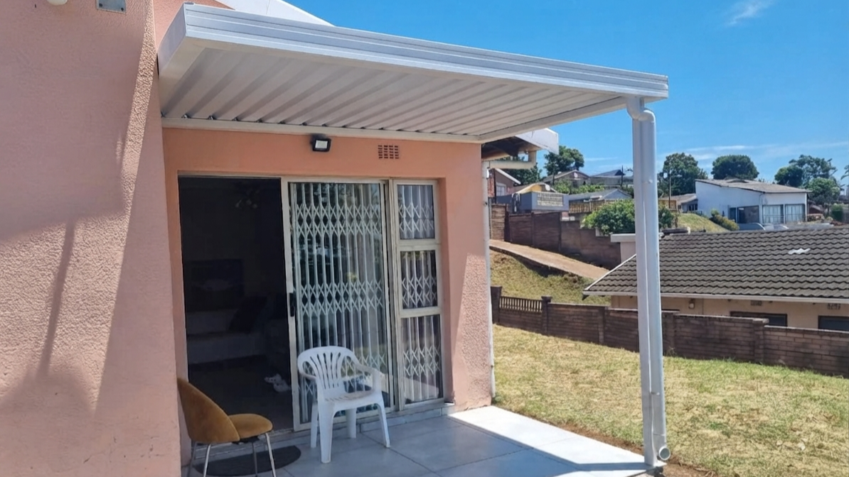 Patio after awning installation - shaded outdoor space